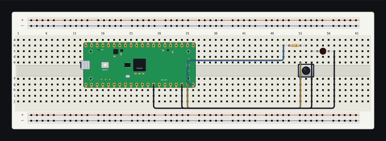 An RP2040 MicroPython Board on a breadboard with a button and LED